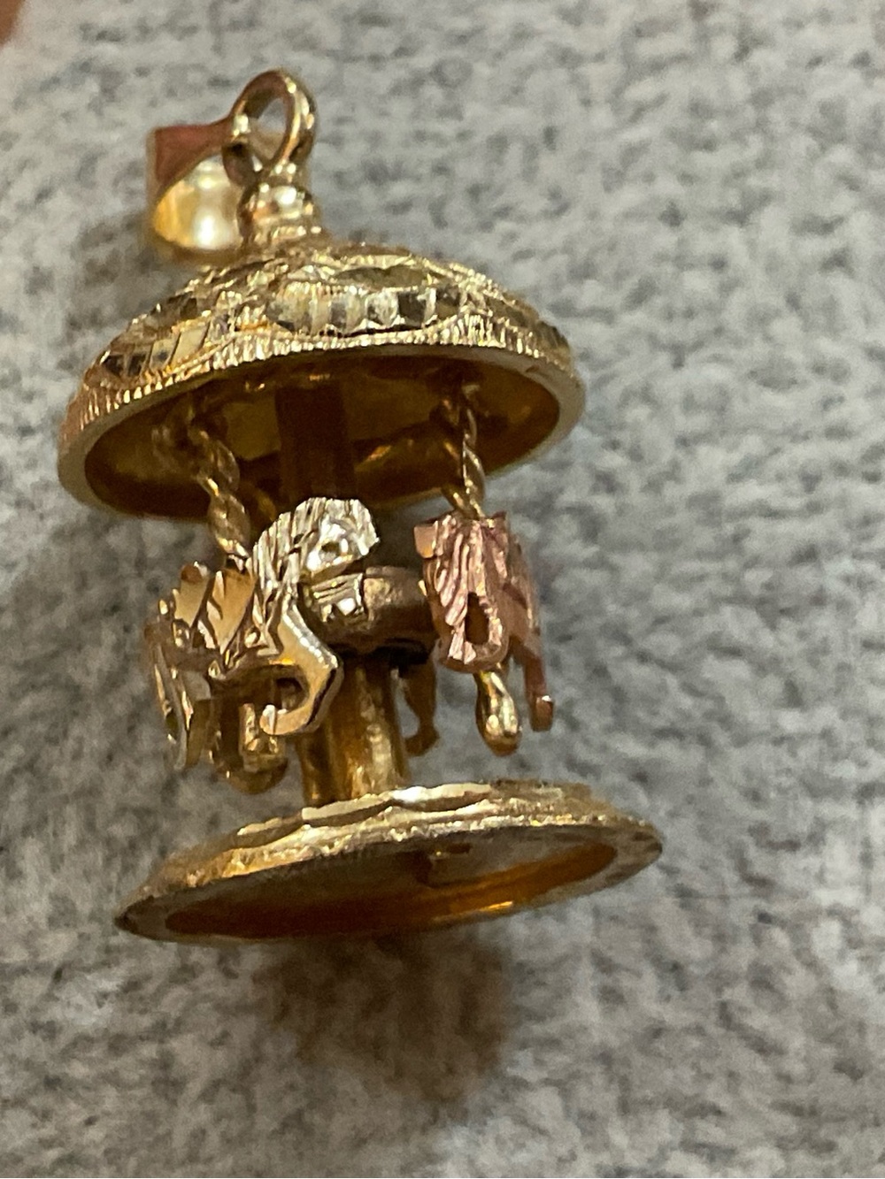 Beverly Hills Gold: 14k. Tri/colored rotating. Moving,spinning horses carousel